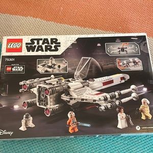 New unopened box lego starwars Luke skywalker x wing fighter.